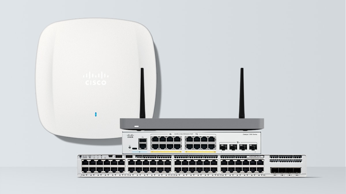 Cisco wireless access point and two stacked Cisco network switches.