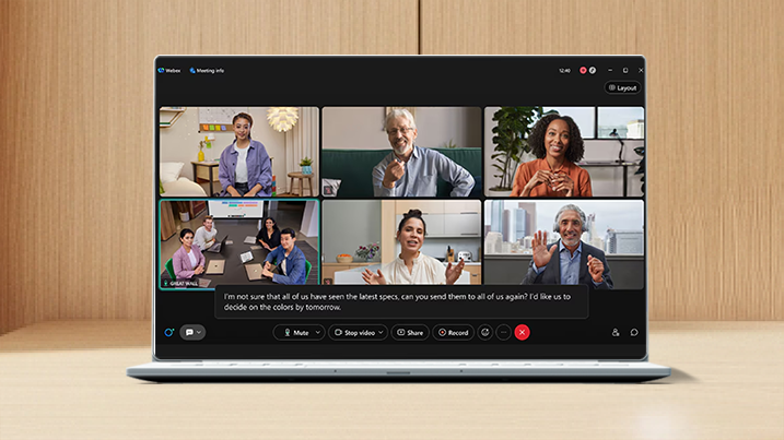 Webex meeting screen showing six video participants and a text caption: "I'm not sure that all of us have seen the latest specs..."